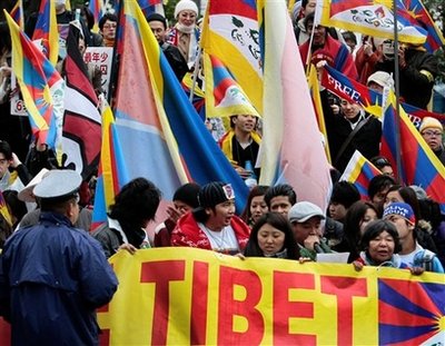 Free Tibet activists march during a peace march rally in Tokyo, Japan, Saturday, March 14, 2009. The rally marks the 50th anniversary of the failed uprising against the Chinese rule in their homeland. (AP Photo/Itsuo Inouye)