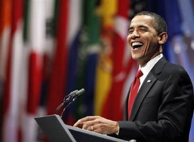 U.S. President Barack Obama laughs during a news conference after the G20 summit at the ExCel centre in east London April 2, 2009. Where President George W. Bush was known for his "cowboy diplomacy," his successor, Obama wants to be known as a listener and a builder of bridges. Reuters/Kevin Coombs