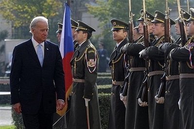 US Vice President Joseph Biden (l) and Czech Prime Minister Jan Fischer (unseen) review a guard of honor at the start of their meeting. The Czech Republic said it was ready to take part in a new US missile defence plan, after visiting US Vice President Joe Biden also won backing from fellow NATO allies Poland and Romania. (AFP/Michal Cizek)